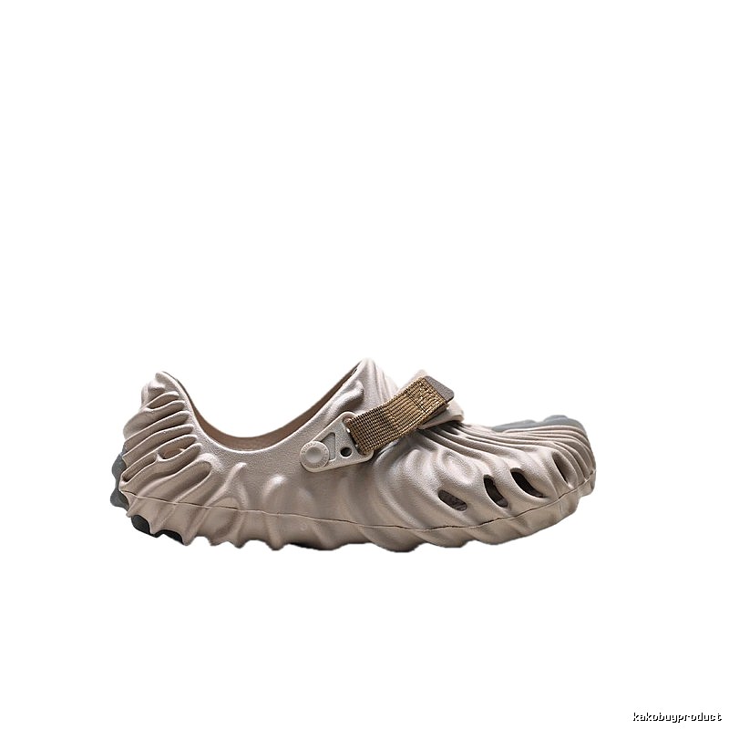 Fashionable beige Crocs clogs