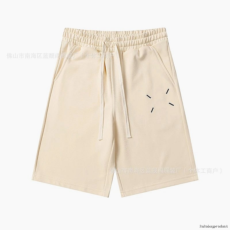 Maison Margiela minimalist style beige shorts